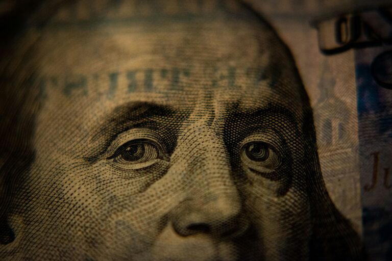 Benjamin Franklin close up on a dollar bill