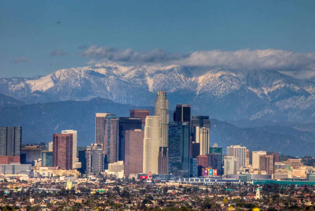 A view of downtown Los Angeles with mountains in the background